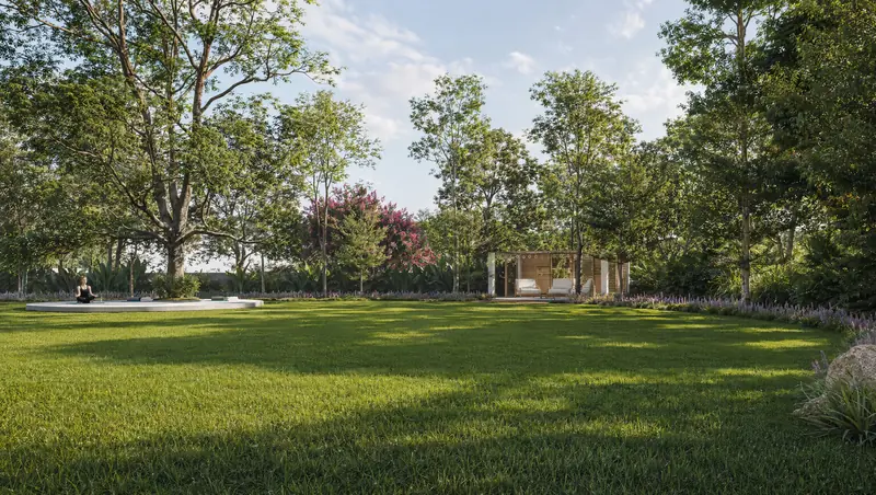 Open leisure lawn with a yoga deck and pavilion among trees